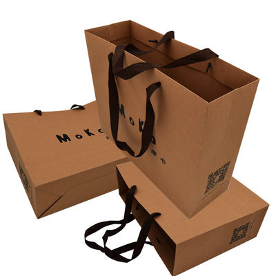 Bolsos de compras de papel personalizados de Brown del papel del arte con la mercancía de la cinta
