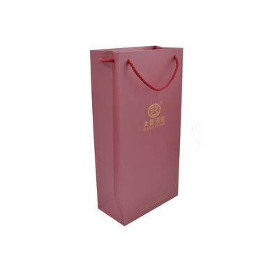Pequeños bolsos que hacen compras de papel de encargo rojos reciclables de Kraft con la manija